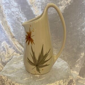 Elegant Ceramic Pitcher with Leaf Design